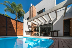 Lindo duplex geminado na Praia de Mariscal.
